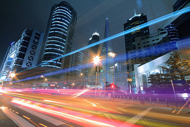 istock Modern office building background of night with light trails 149160511