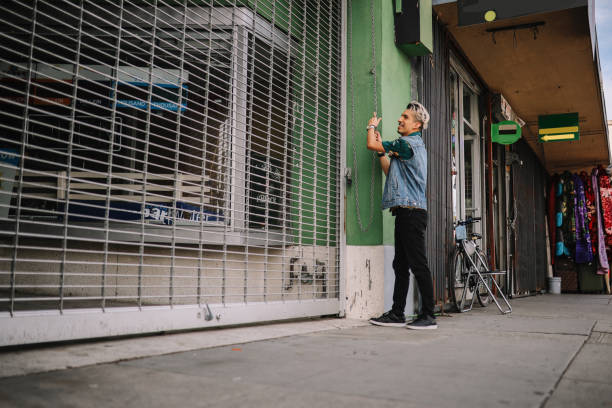 istock owner opening a small LA convenience store in the morning 1491605897