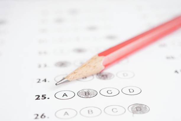 istock Answer sheets with pencil drawing fill to select choice, education concept. 1491612407