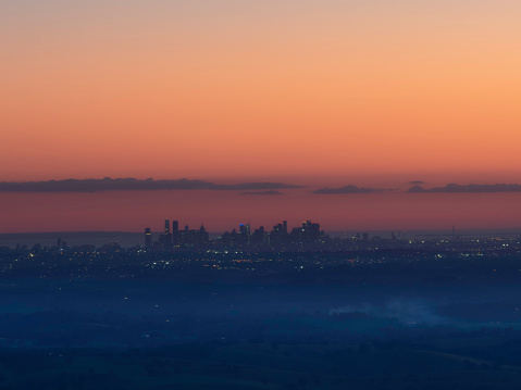 The distant skyline of Melbourne at sunset
