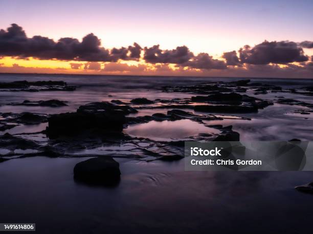 Sunrise Rocks At Beach Stock Photo - Download Image Now - Adventure, Atmospheric Mood, Australia