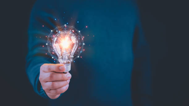 istock Man hand holding illuminated light bulb, creative with glowing light bulb. Innovation and inspiration idea concept. Inspiration concept of learning, new knowledge and sustainable business development. 1491618063