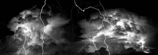 istock Panorama Dark cloud at evening sky with thunder bolt. Heavy storm bringing thunder, lightnings and rain in summer. 1491618431