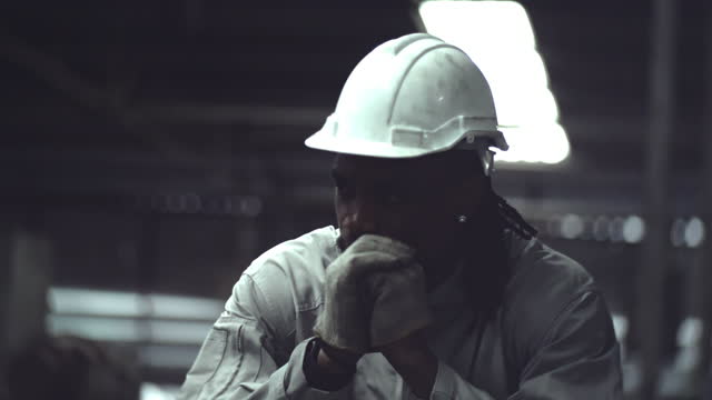 Economic Depression / Black male factory worker