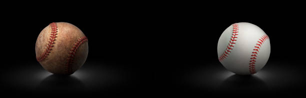 istock baseball ball on black background, wide image 1491634318