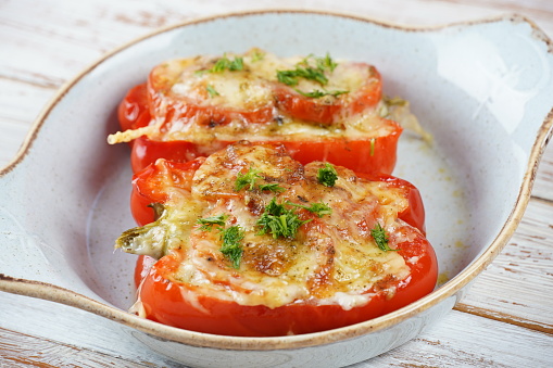 Bell peppers stuffed with ground beef and cheese