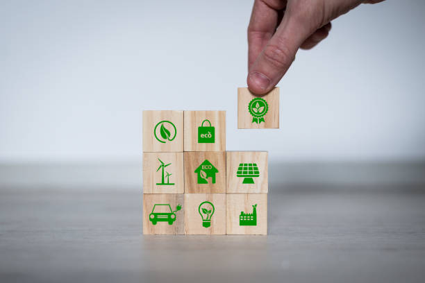 istock Net zero action concept. Save energy, green energy, reduce carbon footprint, carbon capture. Climate neutral long term strategy. Limit global warming. Putting wooden cubes with green net zero icon 1491639401