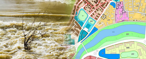 Flood hazard for buildings and towns near rivers - concept with flooded fields after torrential rain and imaginary city map stock photo