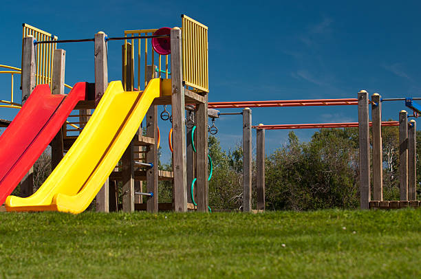 Playground slides stock photo