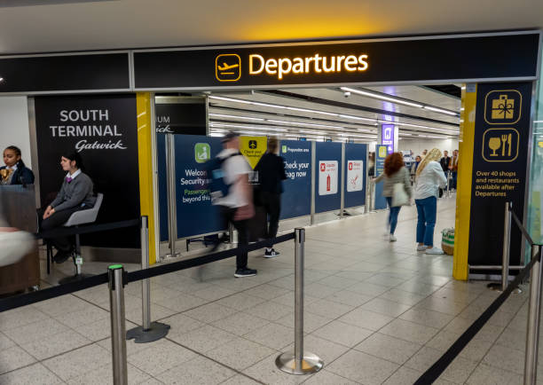 The entrance to Departures at Gatwick Airport South Terminal. Gatwick.UK- 05.13.2023. The entrance to Departures at Gatwick Airport South Terminal. gatwick airport photos stock pictures, royalty-free photos & images