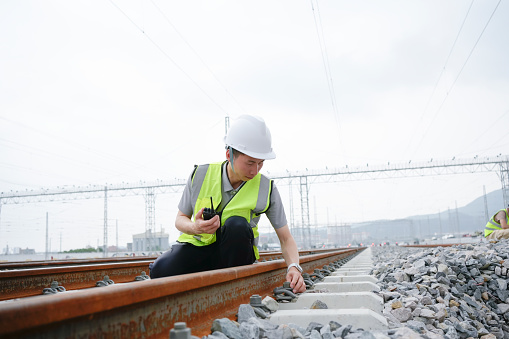 The engineer checked and accepted the railway stone