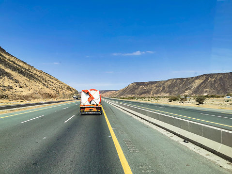 semi truck in desert highway