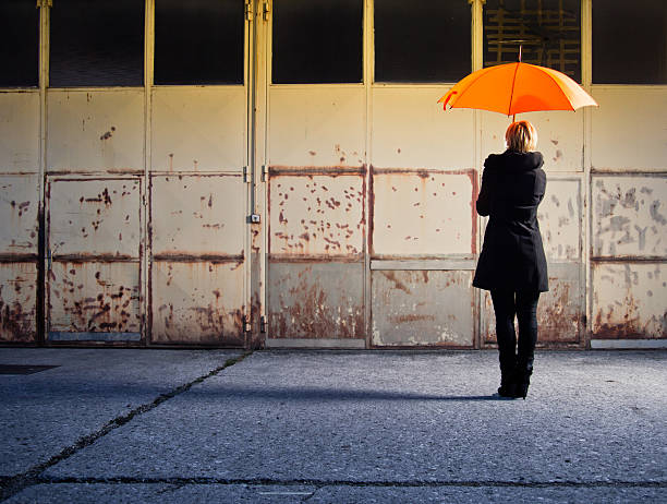 istock Woman with umbrella 149165556