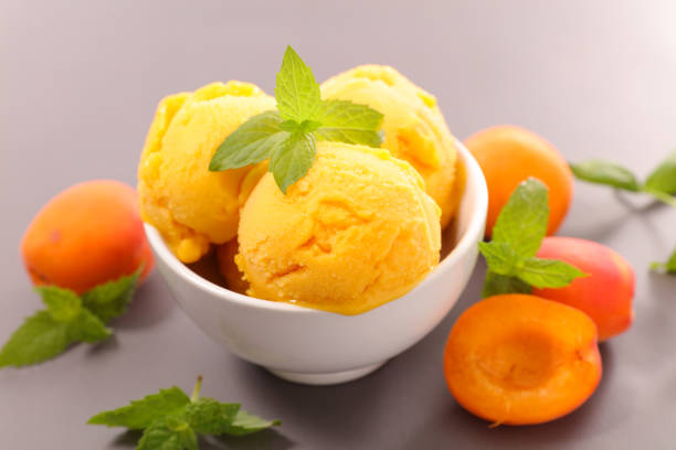 istock apricot ice cream scoop in bowl- summer refreshing 1491656705