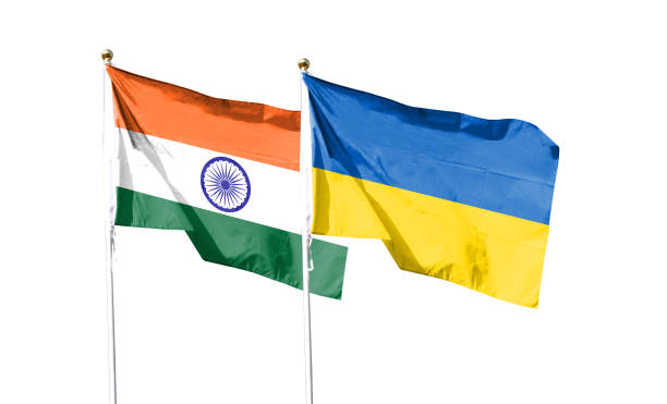 istock Indian flag and Ukrainian flag. waving in the blue sky 1491658024