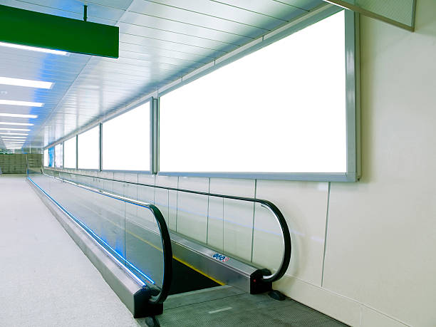 cartelera en blanco en pared - moving walkway fotografías e imágenes de stock