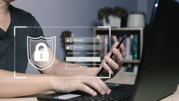 istock Businessman protecting personal data on smart phone and laptop with virtual screen interfaces. Cyber security and privacy concepts to protect data. Lock icon and internet network security technology. 1491662560
