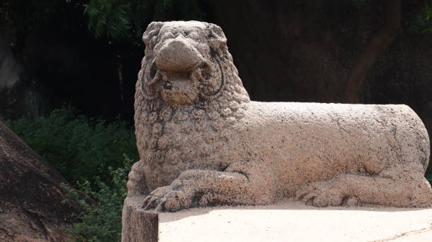 istock Tharamaraja Stone Throne This is a large rectangular lion-shaped throne carved out of a single stone. one side view Incomplete stone sculpture with blur backround 1491663698