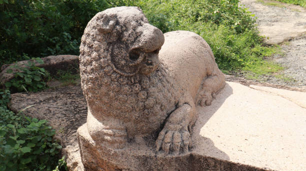 istock Tharamaraja Stone Throne This is a large rectangular lion-shaped throne carved out of a single stone. one side view Incomplete stone sculpture with blur backround 1491663717