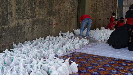 Bogor, Indonesia - July 11, 2022 : plastic packages containing sacrificial meat to be distributed to people in need