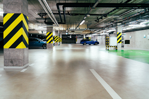 Underground garage. Office building. Real estate. Free parking spaces.