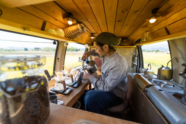 istock A man making coffee in his mobile coffee van parked outdoors 1491675111