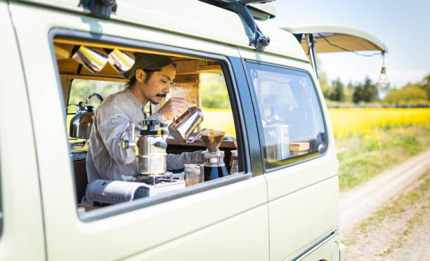 istock A man making coffee in his mobile coffee van parked outdoors 1491675127