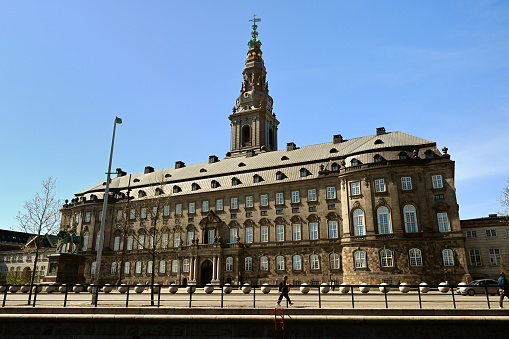 The entrance to the Danish parliament which is situated in Christiansborg castle in the middle of Copenhagen. The current Christiansborg is build in a neo-baroque style. The construction took place from 1906 to 1928 after a fire had destructed the former castle.