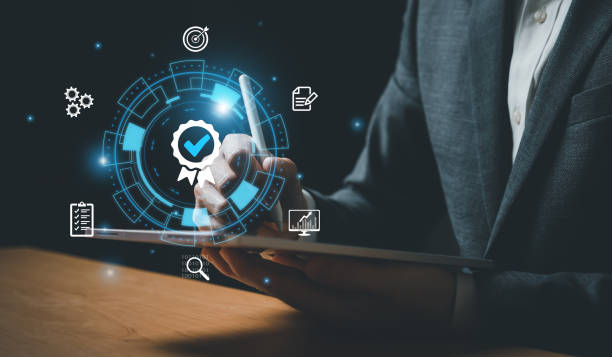 istock Entrepreneur using digital tablet to approve certificate that show top service quality standard in business or commercial service certification. Quality assurance formal concept in organization. 1491681783