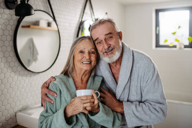 istock Senior couple having morning routine in their bathroom. 1491683771