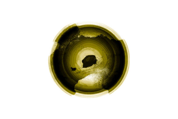 Abstract graphic  showing simulated black and gold circle symbols decomposing particle layers on a white background.