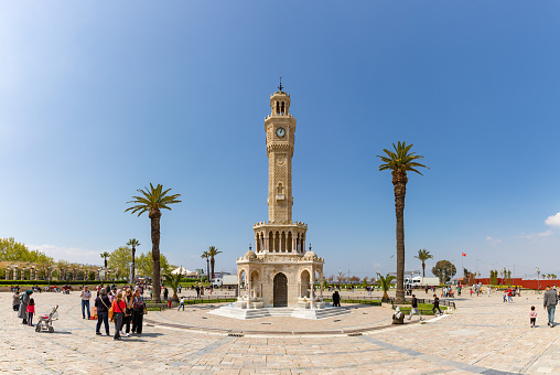 Izmir Clock Tower is a historic clock tower located at the Konak Square. Izmir, Turkey - July 1, 2023.