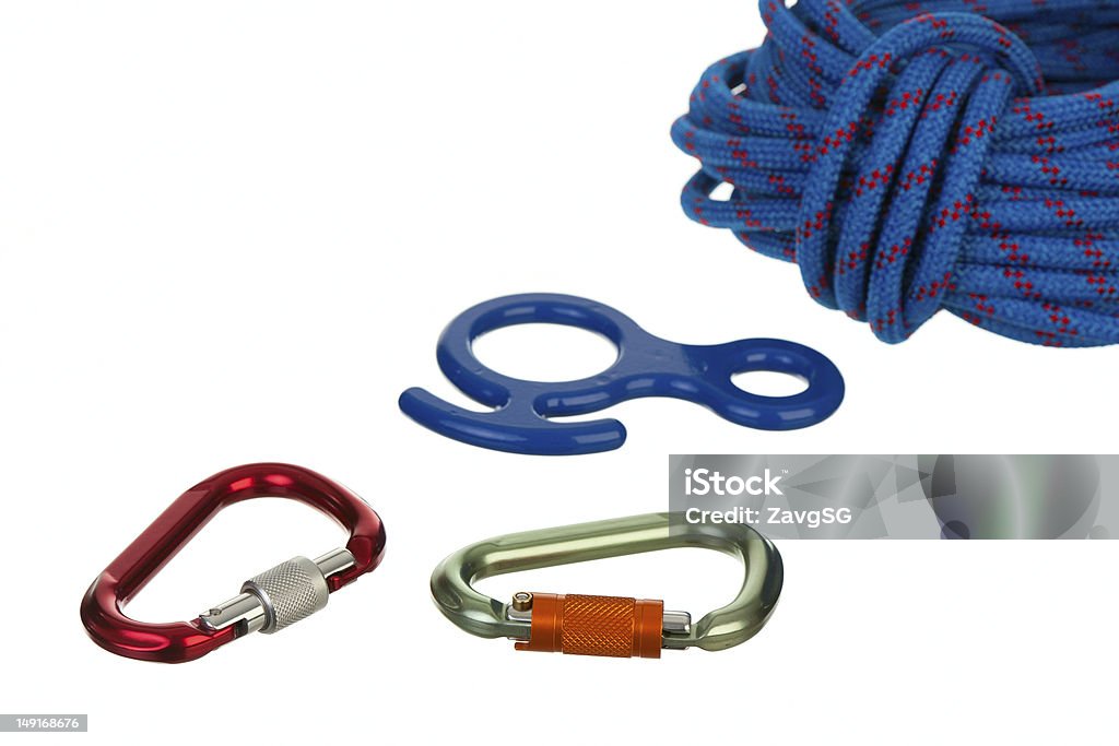 Climbing gear Climbing gear, isolated over white background Activity Stock Photo