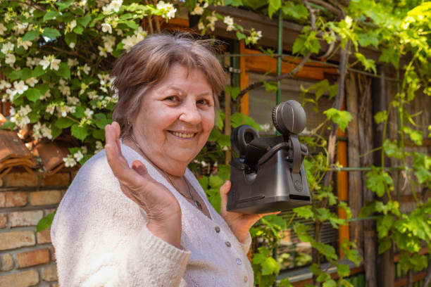 istock Funny senior woman with VR glasses 1491690407