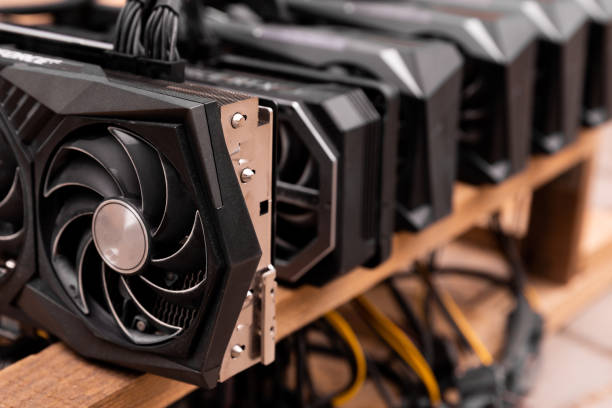 istock Bitcoin mining farm. IT equipment. Electronic devices with fans. Cryptocurrency miners. Money making concept. Cryptocurrency equipment for money mining. electronic finance coin 1491695220