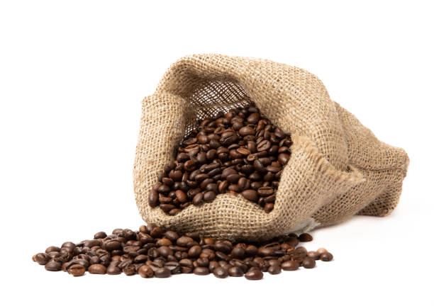 istock Coffee beans in a bag isolated on white background. 1491696683