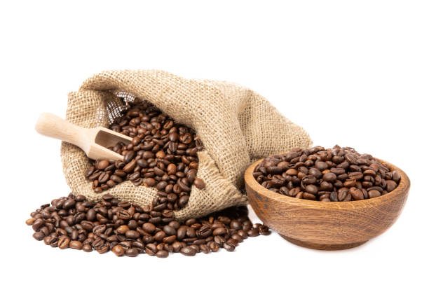 istock Coffee beans in a bag isolated on white background. 1491696685
