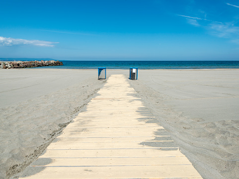 Empty beach waiting for tourists in Pomorie town. Bulgaria, Europe.