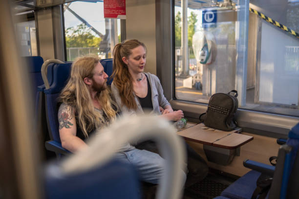 istock Cute couple traveling with train 1491699109