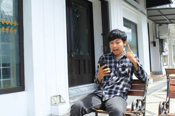 istock excited young asian man got an brilliant idea 1491699307