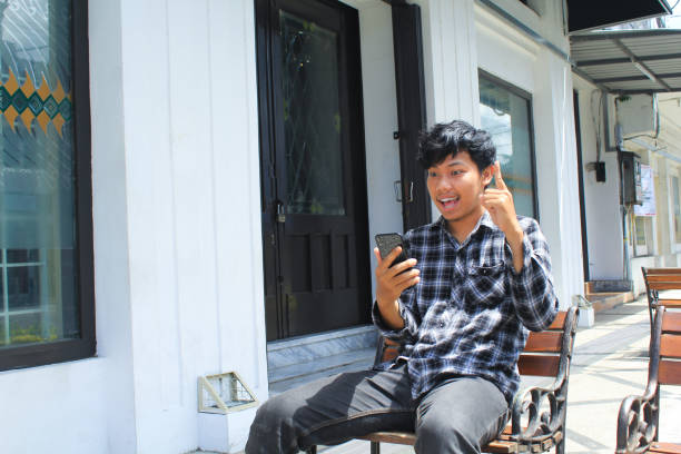 istock excited young asian man got an brilliant idea 1491699311
