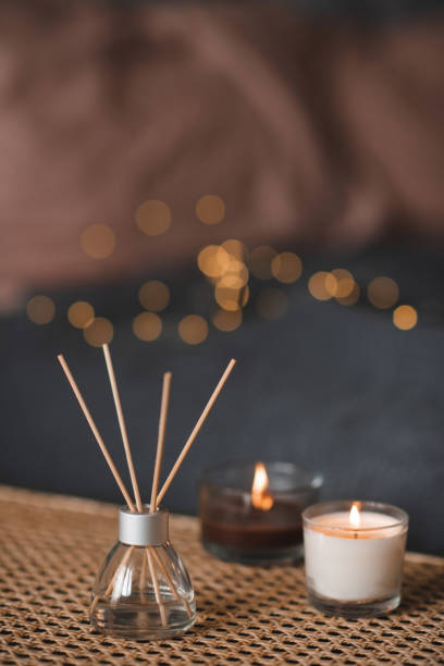 istock Cozy hygge home atmosphere with aroma sticks 1491702469