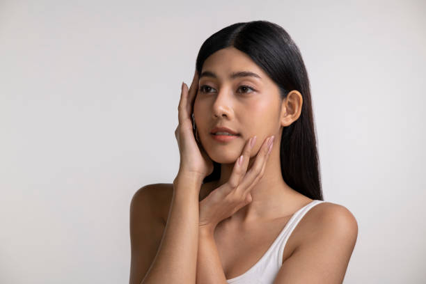 istock Attractive young Asian woman posing on white background 1491702787