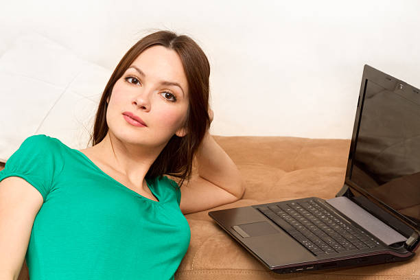 Woman with laptop stock photo