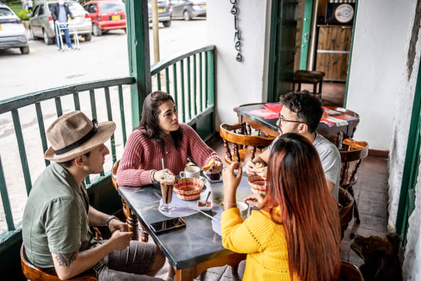 istock Friends talking while eat at a coffee shop 1491708460