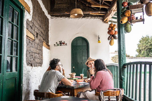 istock Friends talking while eat at a coffee shop 1491709311