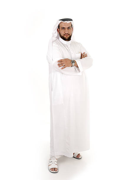 istock Man wearing traditional garment in front of white background 149170935