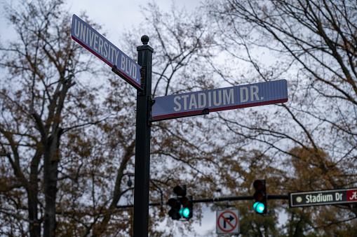 Tuscaloosa, AL - December 2020: Street sign at the corner of University Boulevard and Stadium Drive on campus of the University of Alabama.