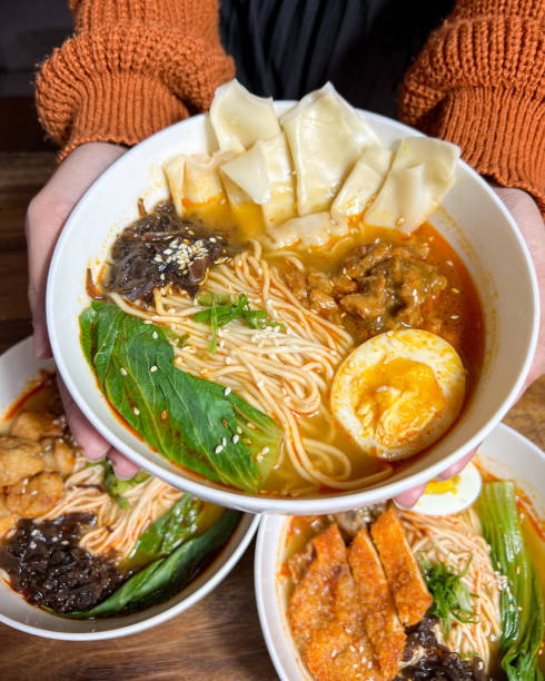 istock Ramen soup with boiled eggs, mushrooms, dim sum and vegetables 1491710029