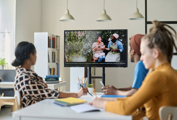 istock Students watching film in English in class 1491717101